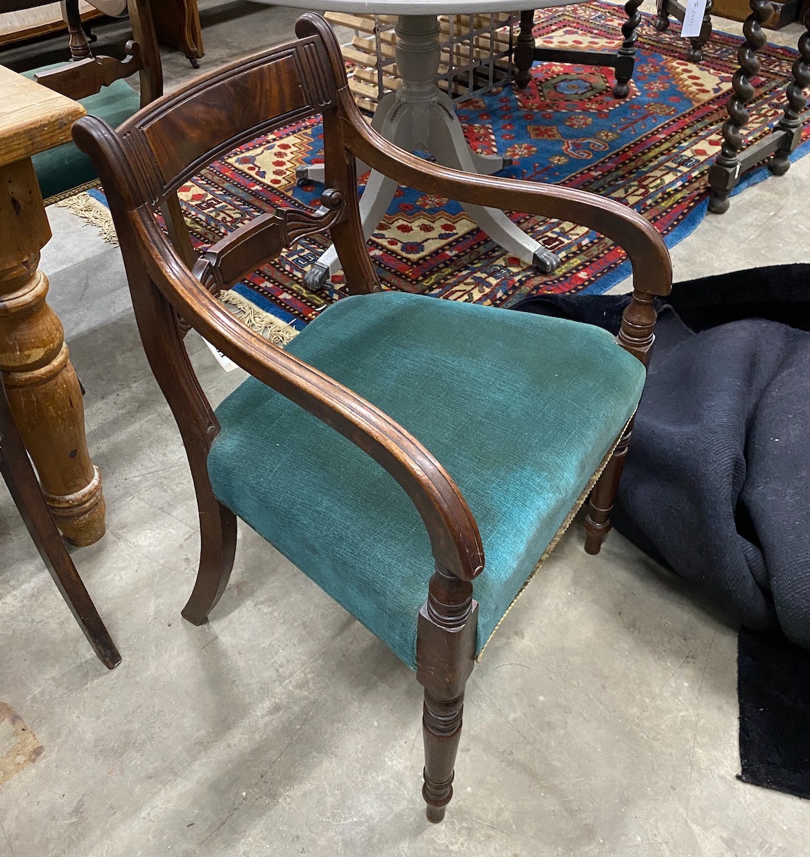 A set of eight Regency mahogany dining chairs, two with arms
